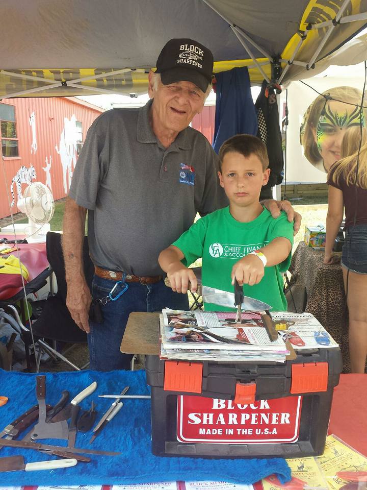 Paul Block JR teaching his gran son how to sell his knife sharpener.