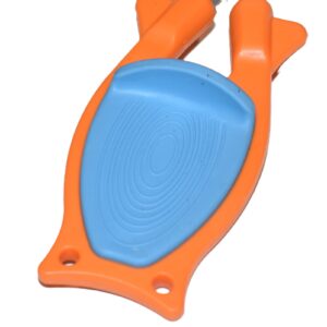 Close-up of the patented blue non-slip rubber grip and safety thumb guard on the orange Block sharpener.