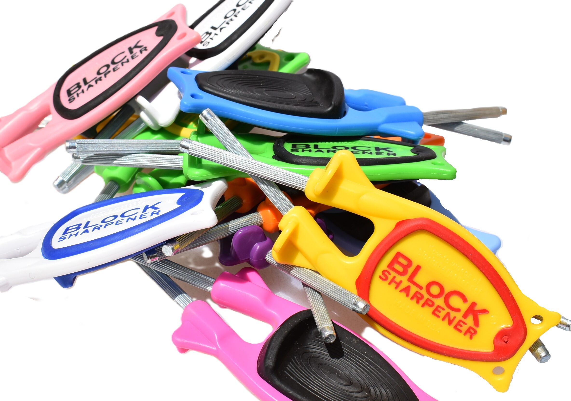 pile of Block sharpener in colors yellow, red, green, white, blue, black