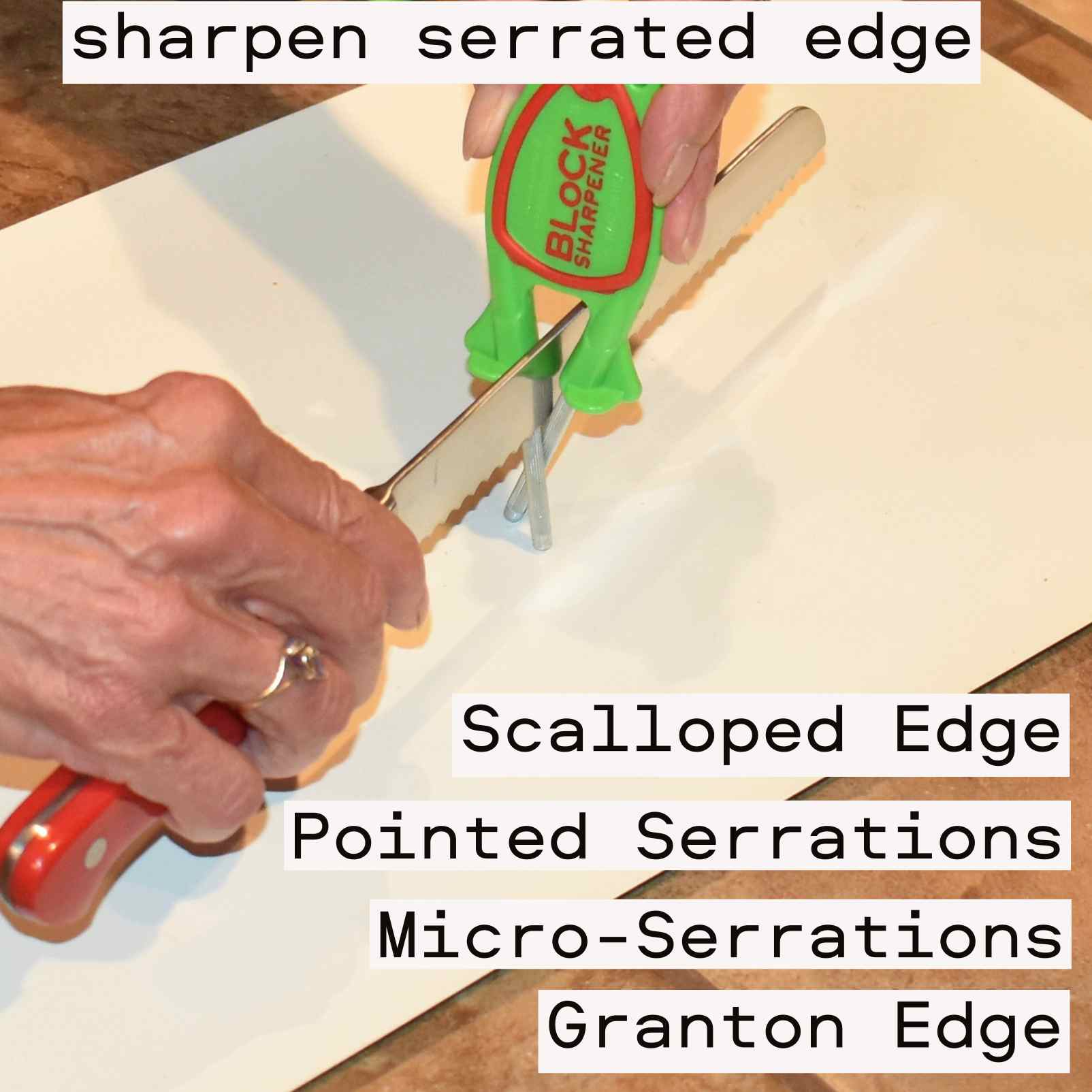 Hand holding the green Block Sharpener highlighting the red non-slip grip and compact design.