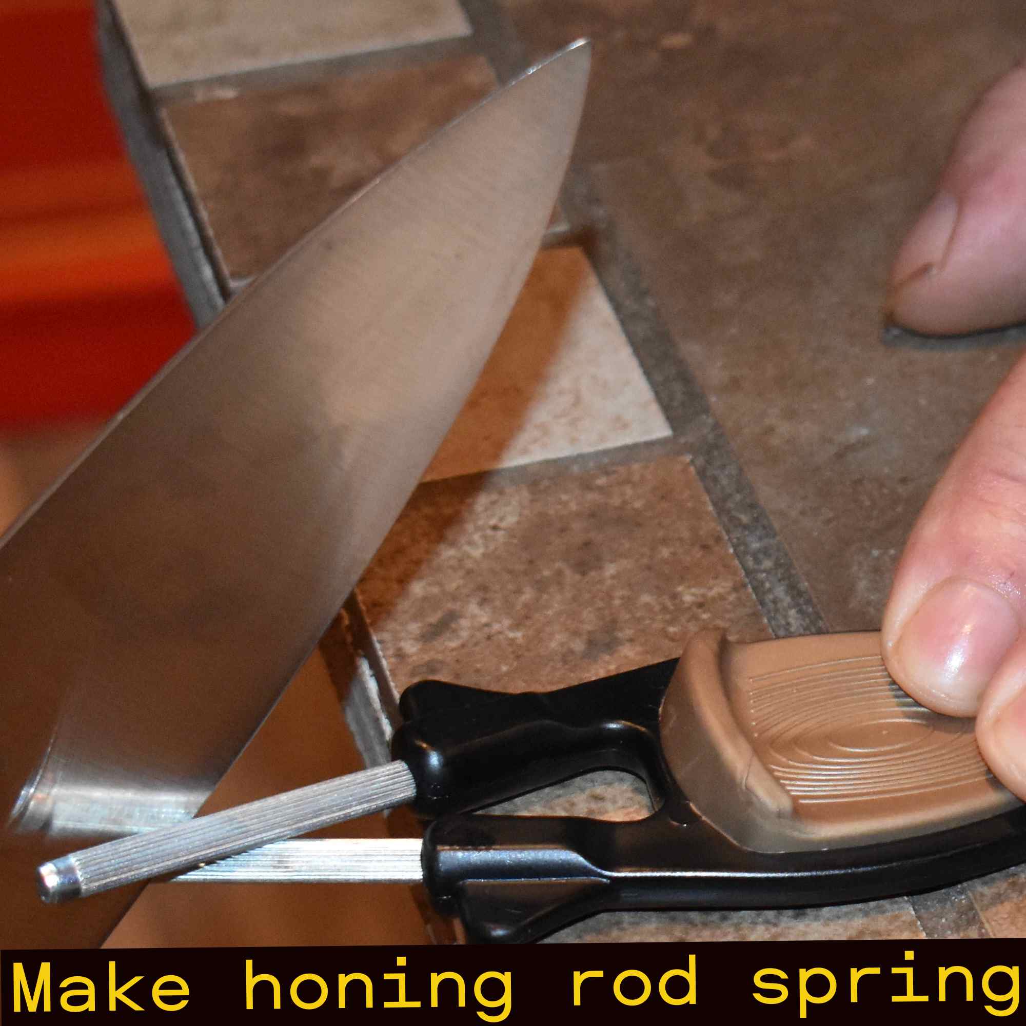 Sharpening chef knife with a Black and gold color Block sharpener.