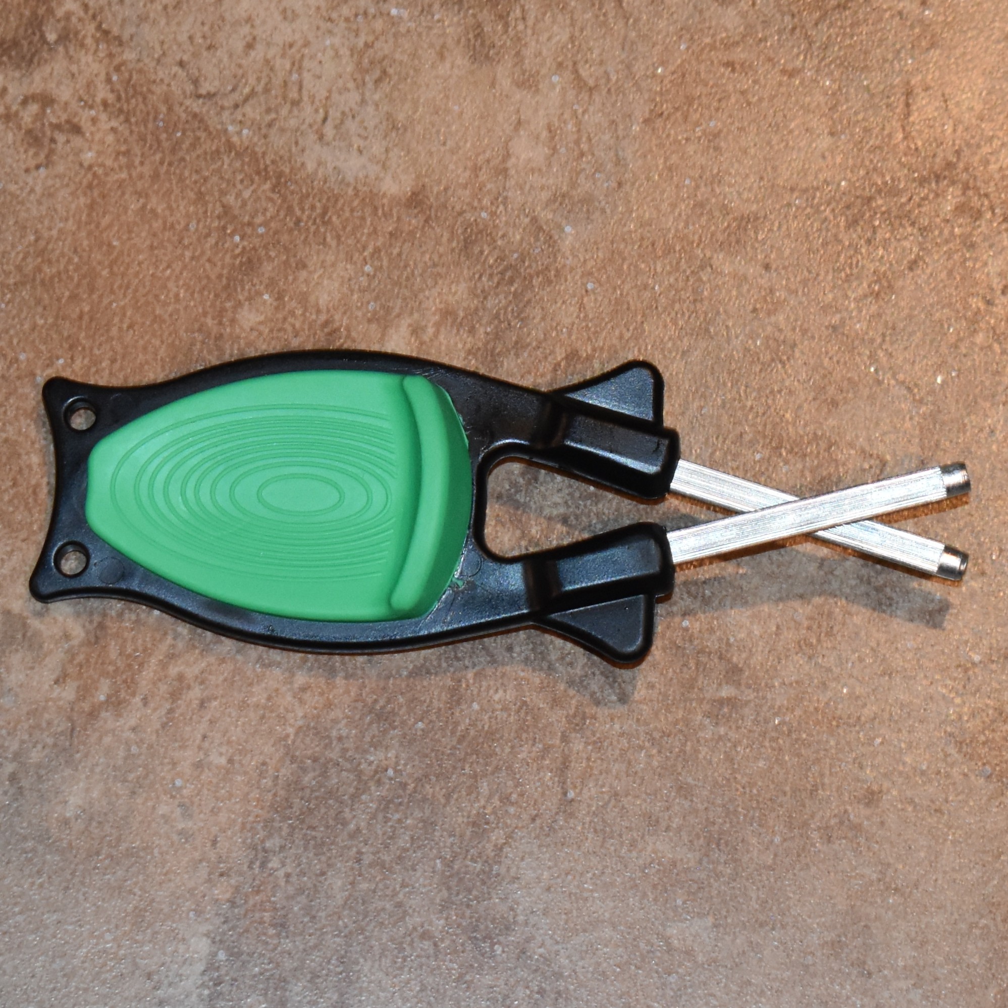 Black Block knife sharpener with army green thumb grip
