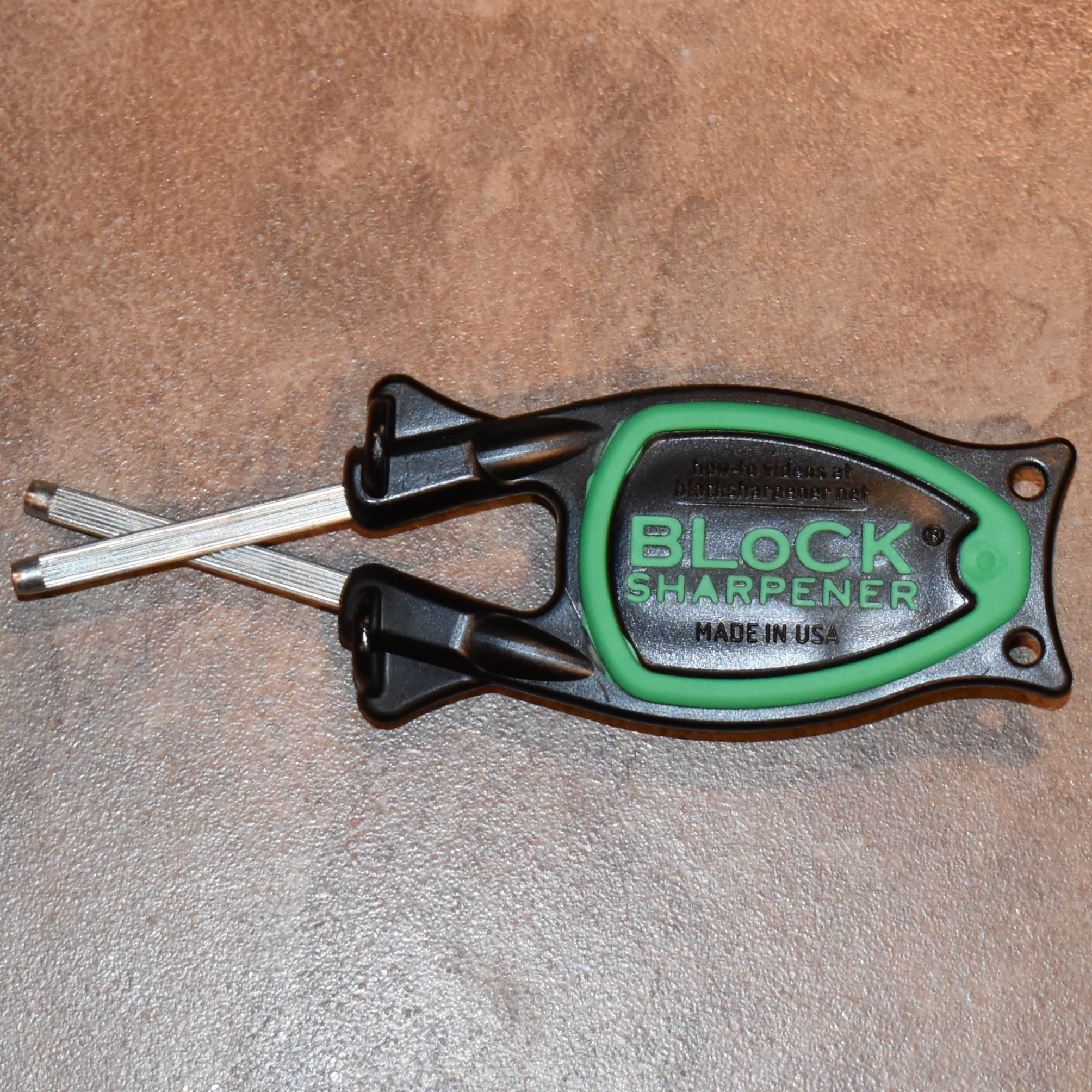 Black with army green nonslip grip on a Block sharpener 2026 handle.