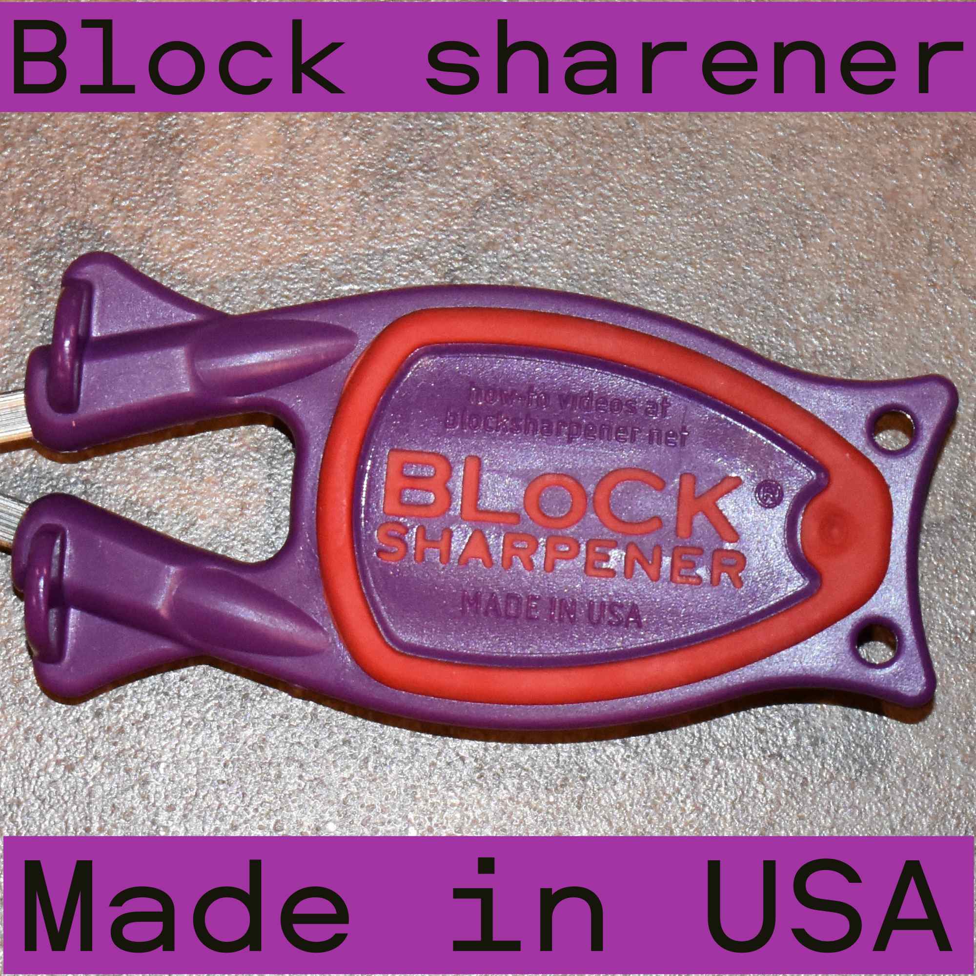 Purple with a red nonslip grip on the bottom side of a block sharpener.