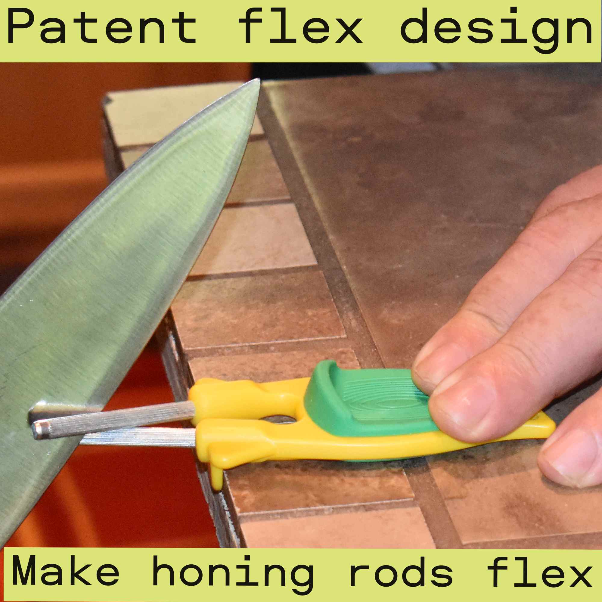 Yellow Block sharpener with green safety grip sharpening a chef knife on a professional slate counter.